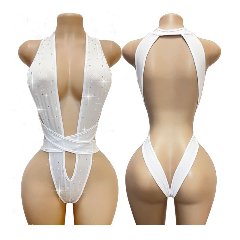 Body con pedrería, escote profundo y espalda descubierta. Elegante y sensual