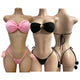 Set strapless de dos piezas con aro central y panty ajustable con detalle de pompones.